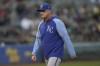 Kansas City Royals manager Matt Quatraro walks to the dugout after making a pitching change during the seventh inning of the team's baseball game against the Oakland Athletics in Oakland, Calif., Tuesday, June 18, 2024. (AP Photo/Jeff Chiu)