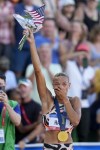 Anna Hall celebrates after winning the women's 800-meter run event and the overall in the heptathlon during the U.S. Track and Field Olympic Team Trials Monday, June 24, 2024, in Eugene, Ore. (AP Photo/Charlie Neibergall)