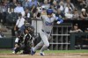 Los Angeles Dodgers' Shohei Ohtani grounds out during the third inning of a baseball game against the Chicago White Sox on Monday, June 24, 2024, in Chicago. (AP Photo/Paul Beaty)