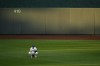 Kansas City Royals center fielder Kyle Isbel waits in the outfield during the fifth inning of a baseball game against the Miami Marlins Tuesday, June 25, 2024, in Kansas City, Mo. (AP Photo/Charlie Riedel)