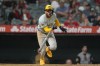 Milwaukee Brewers' Jackson Chourio reacts after grounding into a double play during the ninth inning of the tema's baseball game against the Los Angeles Angels, Wednesday, June 19, 2024, in Anaheim, Calif. Gary Sanchez was out at second. (AP Photo/Ryan Sun)