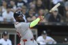 Atlanta Braves' Marcell Ozuna flies out to Chicago White Sox's Tommy Pham with two men on base during the eighth inning of a baseball game Thursday, June 27, 2024, in Chicago. (AP Photo/Melissa Tamez)