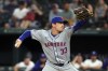 New York Mets relief pitcher Drew Smith delivers in the ninth inning of a baseball game against the Texas Rangers, Monday, June 17, 2024, in Arlington, Texas. (AP Photo/Richard W. Rodriguez)