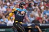 Philadelphia Phillies' Bryson Stott follows through after hitting a run-scoring fielder's choice against Miami Marlins pitcher Kyle Tyler during the fifth inning of a baseball game, Friday, June 28, 2024, in Philadelphia. (AP Photo/Matt Slocum)