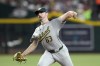 Oakland Athletics pitcher Hogan Harris throws against the Arizona Diamondbacks during the first inning of a baseball game Saturday, June 29, 2024, in Phoenix. (AP Photo/Ross D. Franklin)