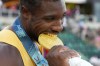 Noah Lyles celebrates after winning the men's 200-meter final during the U.S. Track and Field Olympic Team Trials Saturday, June 29, 2024, in Eugene, Ore. (AP Photo/Charlie Neibergall)