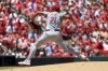 Cincinnati Reds starting pitcher Hunter Greene throws during the first inning of a baseball game against the St. Louis Cardinals, Sunday, June 30, 2024, in St. Louis. (AP Photo/Scott Kane)