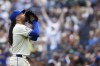 Seattle Mariners starting pitcher Luis Castillo walks off the field after pitching through the first inning of a baseball game against the Minnesota Twins, Sunday, June 30, 2024, in Seattle. (AP Photo/Lindsey Wasson)