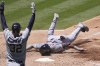Detroit Tigers' Justyn-Henry Malloy, right, scores on an inside-the-park home run that also scored Wenceel Perez as Ryan Kreidler celebrates during the fourth inning of a baseball game against the Los Angeles Angels Sunday, June 30, 2024, in Anaheim, Calif. (AP Photo/Mark J. Terrill)