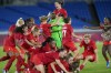 FILE - Canada player celebrate defeating Sweden for the gold medal in women's soccer at the Summer Olympics, Aug. 6, 2021, in Yokohama, Japan. Defending Olympic gold medalist Canada is looking to re-establish itself following last year’s Women’s World Cup disappointment. (AP Photo/Fernando Vergara, File)