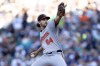 Baltimore Orioles starter Dean Kremer delivers a pitch during the first inning of a baseball game against the Baltimore Orioles, Wednesday, July 3, 2024, in Seattle. (AP Photo/Stephen Brashear)