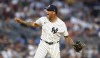 New York Yankees' Luis Gil reacts after the third out during the sixth inning of a baseball game against the Boston Red Sox, Sunday, July 7, 2024, in New York. (AP Photo/Noah K. Murray)