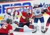 Florida Panthers goaltender Sergei Bobrovsky (72) makes a save as Edmonton Oilers forward Zach Hyman (18) and Oilers forward Connor McDavid (97) eye the loose puck during second period game 2 action of the NHL Stanley Cup finals in Sunrise, Fla., on Monday, June 10, 2024. THE CANADIAN PRESS/Nathan Denette