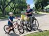 MALAK ABAS / FREE PRESS Meghan Gallant with her 6-year-old twin sons, Emile and Anton Tomchuk. Gallant says she hopes her sons will grow up loving cycling, and that the city will have safer infrastructure for them.