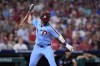 Philadelphia Phillies' Whit Merrifield reacts after flying out against Miami Marlins pitcher A.J. Puk during the eighth inning of a baseball game, Thursday, June 27, 2024, in Philadelphia. (AP Photo/Matt Slocum)