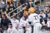 FILE - West Virginia's J.J. Wetherholt watches his home run against Baylor during a college baseball game, April 26, 2024, in Morgantown, W.Va. The Cleveland Guardians have the No. 1 overall pick in next week's draft. They have narrowed the talent pool to just a few possibilities with Oregon State second baseman Travis Bazzana, Georgia outfielder/third baseman Charlie Condon and West Virginia middle infielder Wetherholt believed to be the frontrunning options. (William Wotring/The Dominion-Post via AP, File)