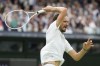 Daniil Medvedev of Russia plays a forehand return to Jannik Sinner of Italy during their quarterfinal match at the Wimbledon tennis championships in London, Tuesday, July 9, 2024. (AP Photo/Alberto Pezzali)