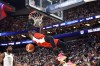 Canada guard RJ Barrett (9) dunks the ball as United States centre Joel Embiid (11) looks on during the second half of an exhibition basketball game on Wednesday, July 10, 2024, in Las Vegas. There’s an immense amount of pride in the heights Canadian basketball has reached entering the Olympics, both on the men’s and women’s sides. THE CANADIAN PRESS/AP/Steve Marcus