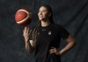 Canadian basketball player Natalie Achonwa poses during media day organized by the Canadian Olympic Committee in Montreal on Thursday, Dec.14, 2023. One body part, or a few, in athletes' bodies endure a lot of strain and overuse while training and competing for Canada.THE CANADIAN PRESS/Christinne Muschi