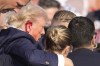 Republican presidential candidate former President Donald Trump is surround by U.S. Secret Service agents as he is helped off the stage at a campaign rally in Butler, Pa., Saturday, July 13, 2024. (AP Photo/Gene J. Puskar)