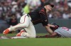 San Francisco Giants third baseman Matt Chapman, left, tags out Minnesota Twins' Willi Castro, right, who was attempting to steal third during the seventh inning of a baseball game Saturday, July 13, 2024, in San Francisco. (AP Photo/Godofredo A. Vásquez)