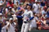 Chicago Cubs' Pete Crow-Armstrong rounds the bases after hitting a solo home run during the fifth inning of a baseball game against the St. Louis Cardinals Sunday, July 14, 2024, in St. Louis. (AP Photo/Jeff Roberson)