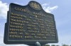 An historical marker near the spot where George Washington “narrowly escaped death” years before he became America’s first president sits alongside a rural road near Butler, Pa, Tuesday, July 16, 2024, near the site of Saturday’s attempted assassination of Republican presidential candidate former President Donald Trump. (AP Photo/Julie Carr Smyth)
