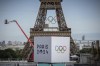 A majority of Canadians will watch this summer’s Paris Olympics in some capacity but only a small percentage will follow closely, according to a new national poll.
Polling firm Leger asked more than 1,500 people about their views of the upcoming Summer Games and their overall perceptions of the Olympics in an online survey conducted between July 12 and 14.The Olympic rings are seen on the Eiffel Tower, Sunday, July 14, 2024, in Paris. THE CANADIAN PRESS/AP/Aurelien Morissard