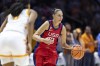 FILE - Team USA guard Diana Taurasi (12) brings the ball up court during the second half of an NCAA college basketball exhibition game against Tennessee, Sunday, Nov. 5, 2023, in Knoxville, Tenn. The 42-year-old guard will be playing in a record sixth Olympics when the U.S. goes for its eighth consecutive gold medal. (AP Photo/Wade Payne, File)