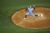 Texas Rangers starting pitcher Andrew Heaney works against the Baltimore Orioles during the first inning of a baseball game, Sunday, July 21, 2024, in Arlington, Texas. (AP Photo/Jeffrey McWhorter)