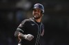 Arizona Diamondbacks' Eugenio Suárez runs the bases after hitting a home run during the seventh inning of a baseball game against the Chicago Cubs, Sunday, July 21, 2024, in Chicago. (AP Photo/Erin Hooley)