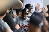 Detroit Tigers' Wenceel Pérez celebrates with teammates after hitting a two-run home run during the fourth inning of a baseball game against the Cleveland Guardians, Tuesday, July 23, 2024, in Cleveland. (AP Photo/Nick Cammett)
