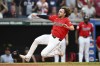 Cleveland Guardians' Daniel Schneemann scores on a single hit by José Ramírez during the sixth inning of a baseball game against the Detroit Tigers, Tuesday, July 23, 2024, in Cleveland. (AP Photo/Nick Cammett)