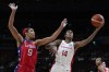 Canada's Kayla Alexander, right, lays up for shot at goal as United States' A'ja Wilson attempts to block during their semifinal game at the women's Basketball World Cup in Sydney, Australia, Friday, Sept. 30, 2022. THE CANADIAN PRESS/AP-Mark Baker