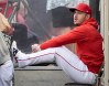 FILE - Los Angeles Angels center fielder Mike Trout sits in the dugout during the second inning of a baseball game against the Houston Astros, June 7, 2024, in Anaheim, Calif. Trout has said an MRI on his left knee came back clean and that he is hoping to resume his rehab soon. (AP Photo/Ryan Sun, File)
