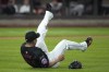 New York Mets' Kodai Senga grabs his leg as he reacts to an injury during the sixth inning of a baseball game against the Atlanta Braves, Friday, July 26, 2024, in New York. (AP Photo/Pamela Smith)