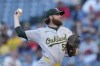Oakland Athletics starting pitcher Paul Blackburn throws during the first inning of a baseball game against the Los Angeles Angels in Anaheim, Calif., Friday, July 26, 2024. (AP Photo/Eric Thayer)