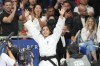 France's Shirine Boukli celebrates after defeating Spain's Laura Martinez Abelenda during their women -48 kg bronze final in team judo competition at Champ-de-Mars Arena during the 2024 Summer Olympics, Saturday, July 27, 2024, in Paris, France. (AP Photo/Eugene Hoshiko)