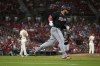 Washington Nationals' Keibert Ruiz, right, rounds the bases after hitting a three-run home run off St. Louis Cardinals relief pitcher Matthew Liberatore (52) during the sixth inning of a baseball game Saturday, July 27, 2024, in St. Louis. (AP Photo/Jeff Roberson)