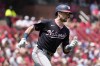 Washington Nationals' Lane Thomas doubles during the first inning of a baseball game against the St. Louis Cardinals Sunday, July 28, 2024, in St. Louis. (AP Photo/Jeff Roberson)