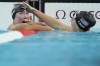 Torri Huske, left, of the United States, reacts after winning the women's 100-meter butterfly final with teammate Gretchen Walsh at the 2024 Summer Olympics, Sunday, July 28, 2024, in Nanterre, France. (AP Photo/Matthias Schrader)
