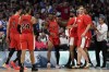 Shai Gilgeous-Alexander, of Canada, celebrates with teammates after scoring and being fouled by Greece in a men's basketball game at the 2024 Summer Olympics, Saturday, July 27, 2024 in Villeneuve-d'Ascq, France. THE CANADIAN PRESS/AP-Mark J. Terrill