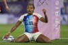 Ian Jason of France reacts after she scores a try during the women's quarterfinal Rugby Sevens match between France and Canada at the 2024 Summer Olympics, in the Stade de France, in Saint-Denis, France, Monday, July 29, 2024. (AP Photo/Tsvangirayi Mukwazhi)