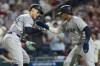 New York Yankees' Aaron Judge, left, celebrates after his second home run with Juan Soto, right, during the seventh inning of a baseball game against the Philadelphia Phillies, Monday, July 29, 2024, in Philadelphia. (AP Photo/Chris Szagola)