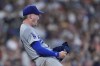 Los Angeles Dodgers starting pitcher River Ryan celebrates after striking out Houston Astros' Joey Loperfido during the fifth inning of a baseball game Sunday, July 28, 2024, in Houston. (AP Photo/Kevin M. Cox)