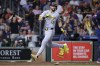 Pittsburgh Pirates' Jared Triolo scores on an RBI single by Oneil Cruz against the Houston Astros during the eighth inning of a baseball game Monday, July 29, 2024, in Houston. (AP Photo/Michael Wyke)