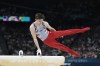 Stephen Nedoroscik, of United States, performs on the pommel during the men's artistic gymnastics team finals round at Bercy Arena at the 2024 Summer Olympics, Monday, July 29, 2024, in Paris, France. (AP Photo/Abbie Parr)
