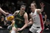 Marena Whittle of Australia, left, controls the ball against Michelle Plouffe, right, during a women's 3x3 basketball final of FIBA Universality Olympic Qualifying Tournament, Sunday, May 5, 2024, in Utsunomiya, north of Tokyo, Japan. Twin sisters Katherine and Michelle Plouffe combined for 18 points as Canada opened its run at the Olympic women's 3x3 basketball tournament with a 22-14 win over Australia. THE CANADIAN PRESS/AP/Shuji Kajiyama