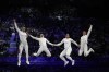 Italy's Alberta Santuccio, second right, celebrates with her teammates Rossella Fiamingo, second left, Giulia Rizzi, left, and Mara Navarria after winning the women's team Epee final match against France during the 2024 Summer Olympics at the Grand Palais, Friday, June 7, 2019, in Paris, France. (AP Photo/Andrew Medichini)
