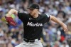 Miami Marlins' Trevor Rogers pitches during the first inning of a baseball game against the Milwaukee Brewers, Friday, July 26, 2024, in Milwaukee. (AP Photo/Aaron Gash)